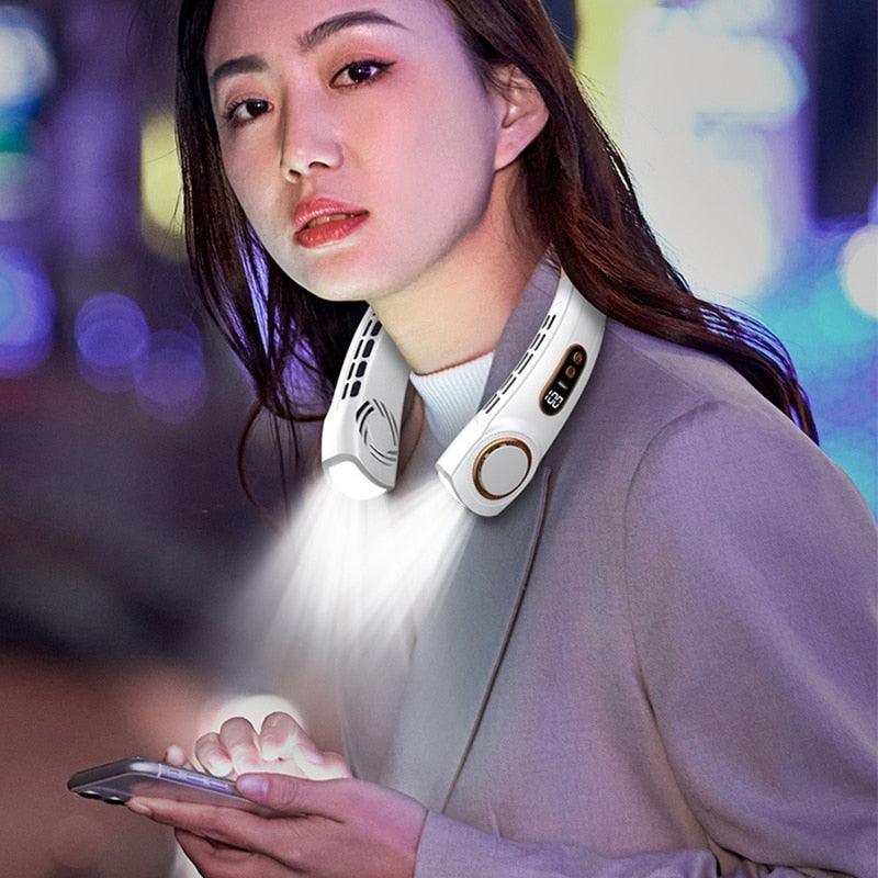 Hanging Neck Fan Ice Magnet Cooling Portable Neck Fan Type-C Mute Multifunctional Leafless Electric Fan With Light Rechargeable Hands Free Bladeless Fan 5 Speeds Operated Wearable Personal Fan (Copy)